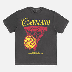 Washed black Cleveland Cavaliers basketball streetwear t-shirt with red and yellow jersey script text and basketball hoop on a unisex comfort colors graphic tee