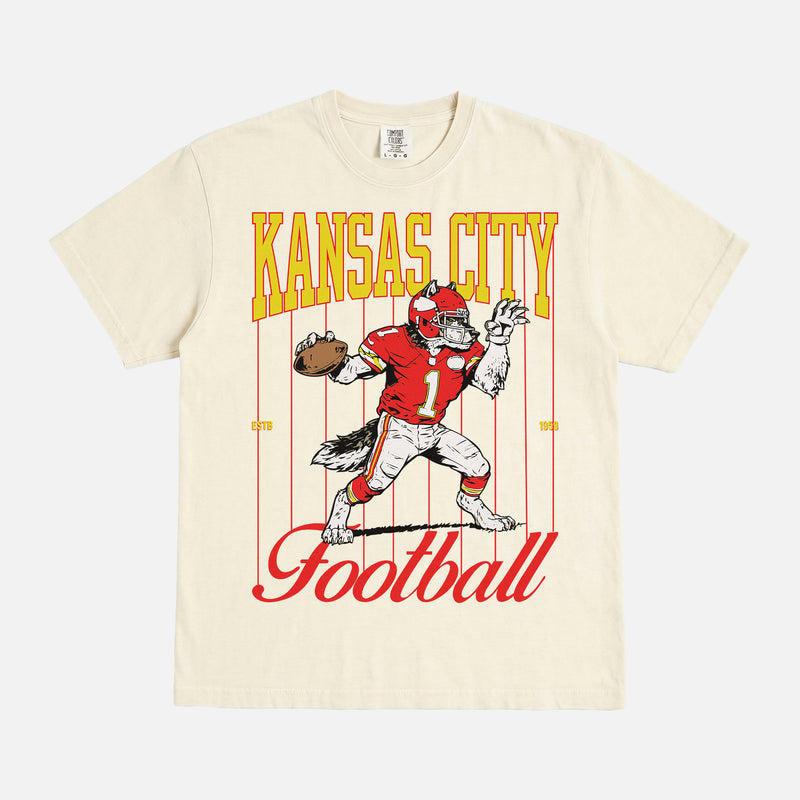 Vintage 80s 90s Kansas City Chiefs washed cream comfort colors graphic tee with old school wolf mascot and pinstripes