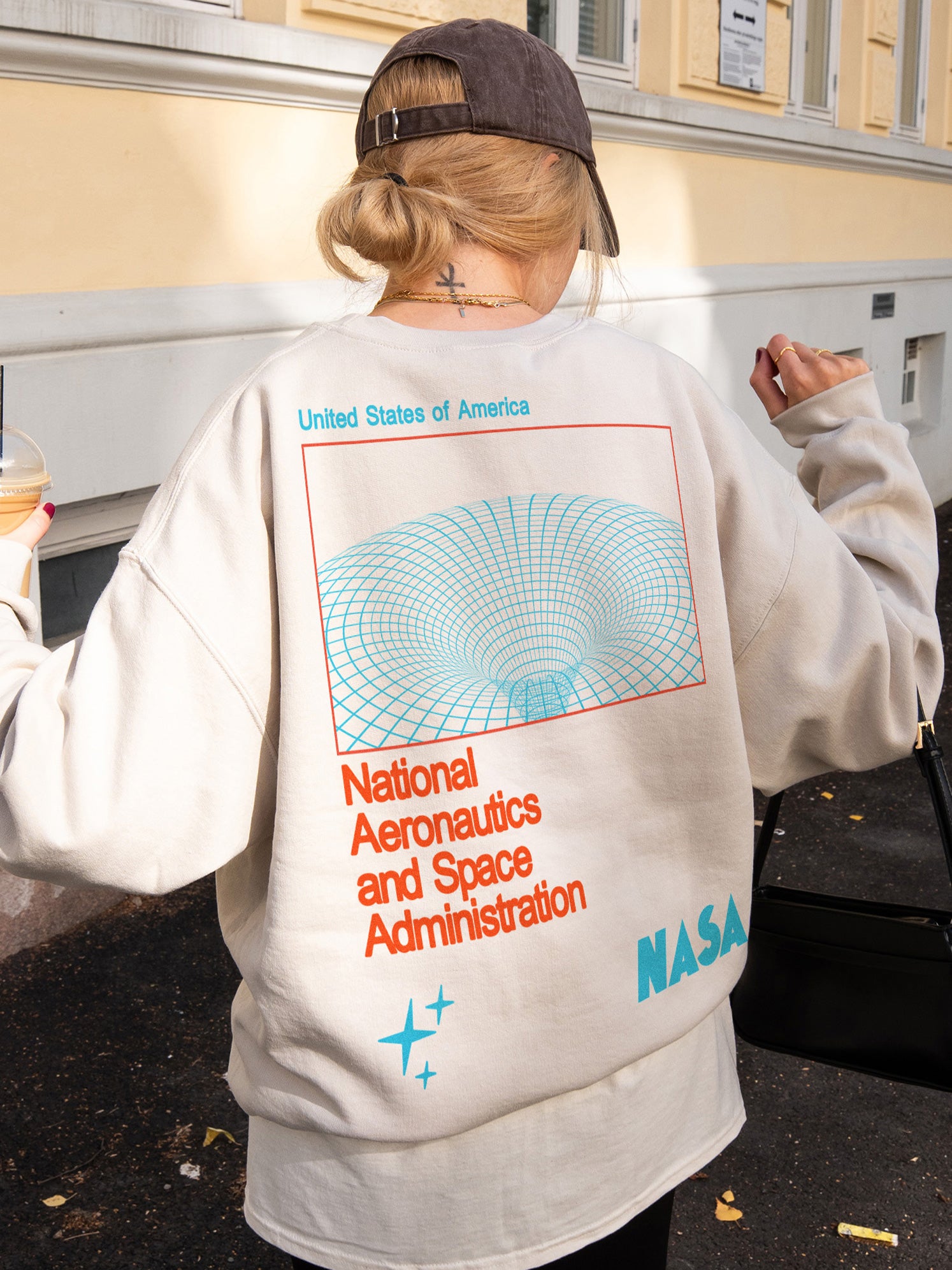 Beige  NASA sweatshirt with front and back print, cute NASA wormhole crewneck for men and women for sale at Throwbacks