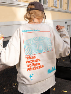 Beige  NASA sweatshirt with front and back print, cute NASA wormhole crewneck for men and women for sale at Throwbacks