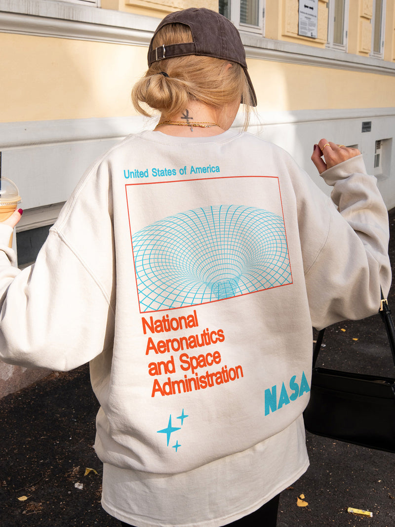 Beige  NASA sweatshirt with front and back print, cute NASA wormhole crewneck for men and women for sale at Throwbacks