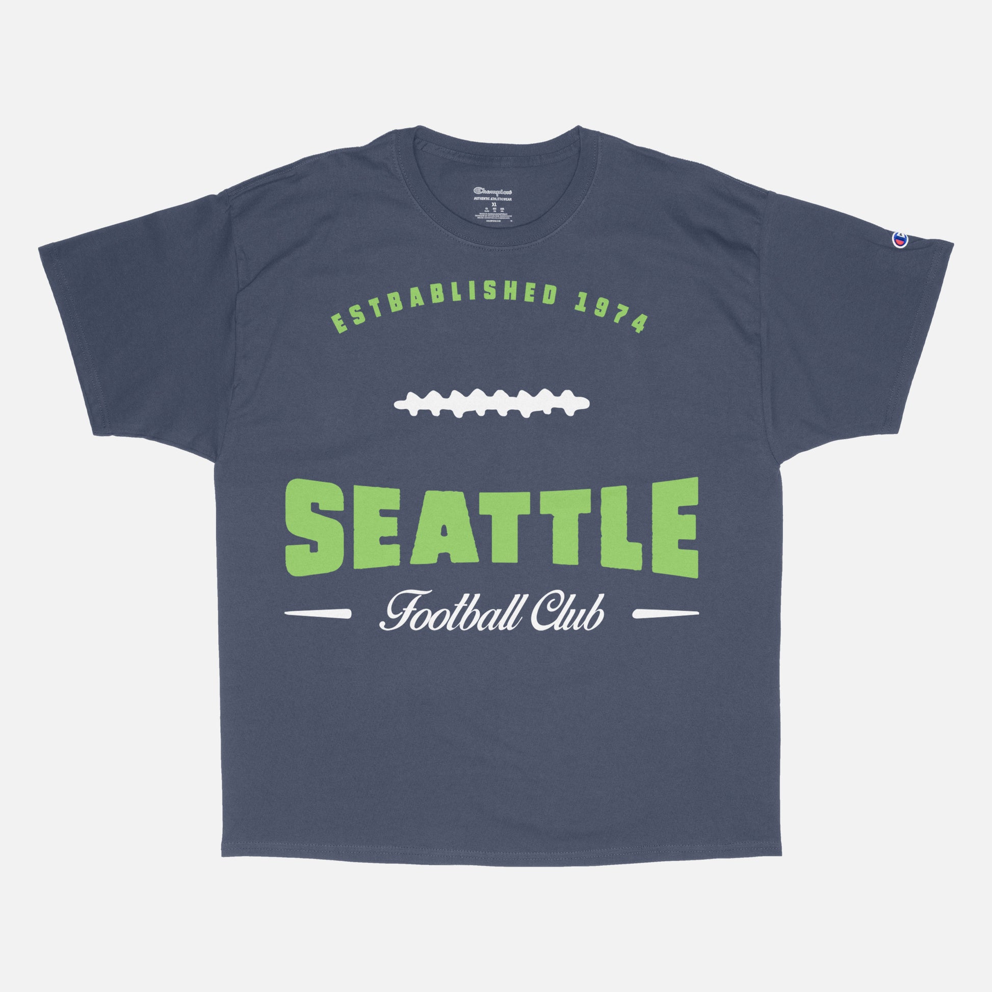 Head to your next Seattle seahawks football game with this vintage lime green graphic tee featuring a retro design printed on a premium unisex navy blue Champion t-shirt 