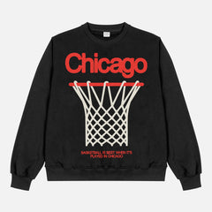Black Chicago Bulls streetwear sweatshirt with large oversized red and white basketball hoop graphic on a premium heavyweight unisex crewneck for sale at Throwbacks