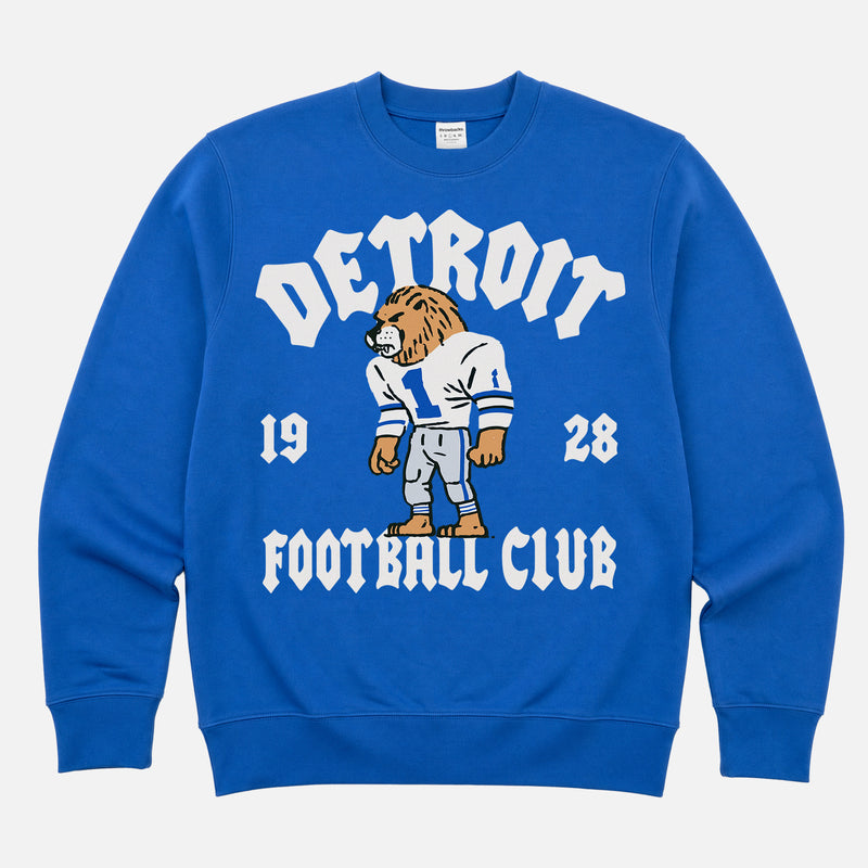 Vintage Detroit Lions football fan sweatshirt with old school mascot graphic and streetwear font on a unisex premium cotton royal blue crewneck
