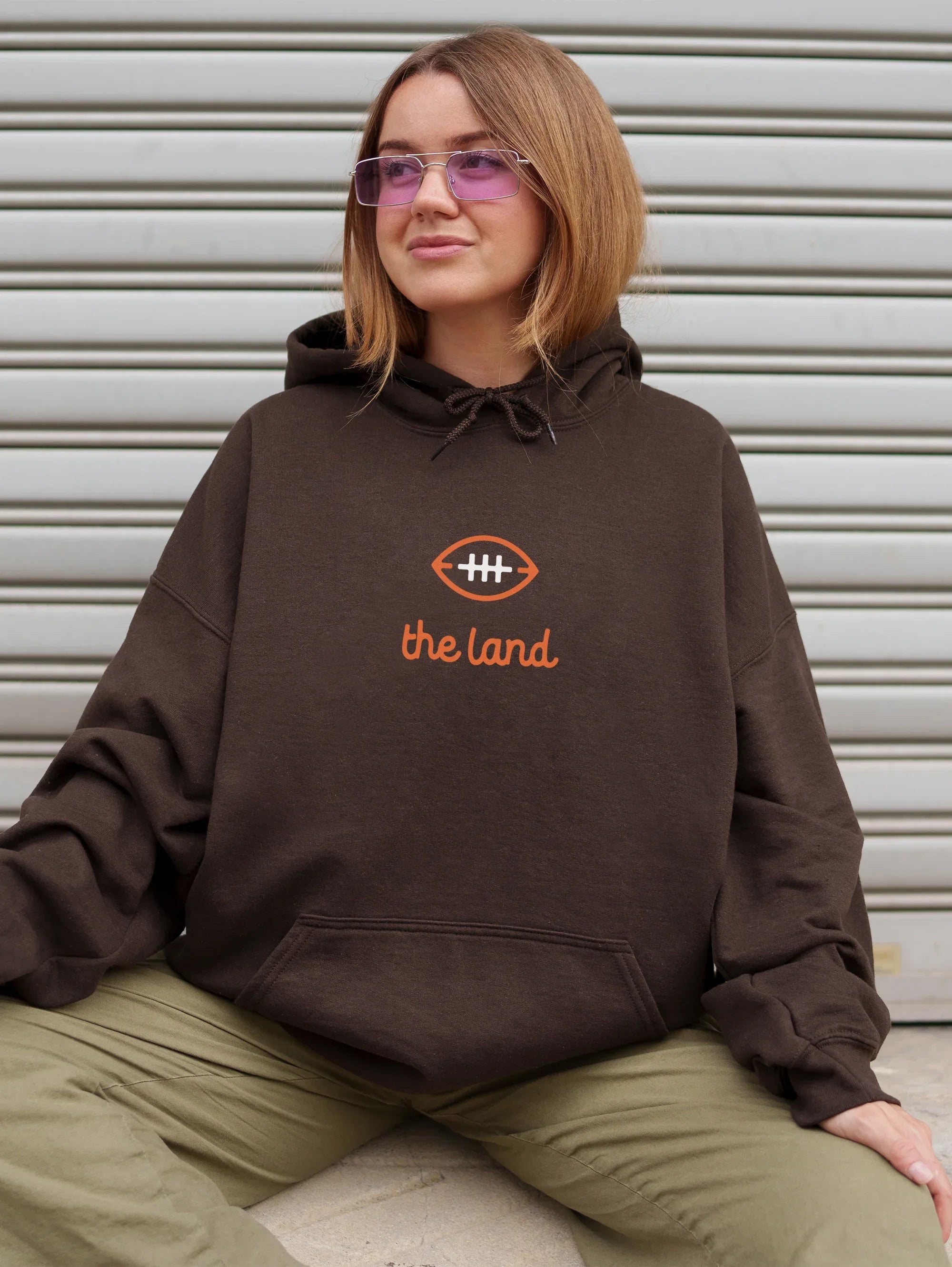 Cute throwback Cleveland Browns "The Land" brown and orange streetwear football hoodie with front and back print