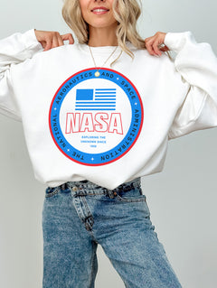 Cute white and blue NASA logo crewneck sweatshirt for men and women, oversized space science nerd apparel