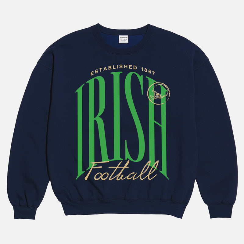 Notre DAme college football sweatshirt with fighting irish green and gold graphic on a premium navy unisex crewneck