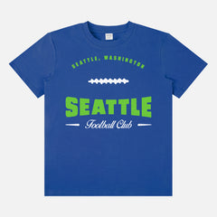 Head to your next Seattle seahawks football game with this vintage royal blue and lime green graphic tee featuring a retro design printed on a premium unisex bella canvas t-shirt