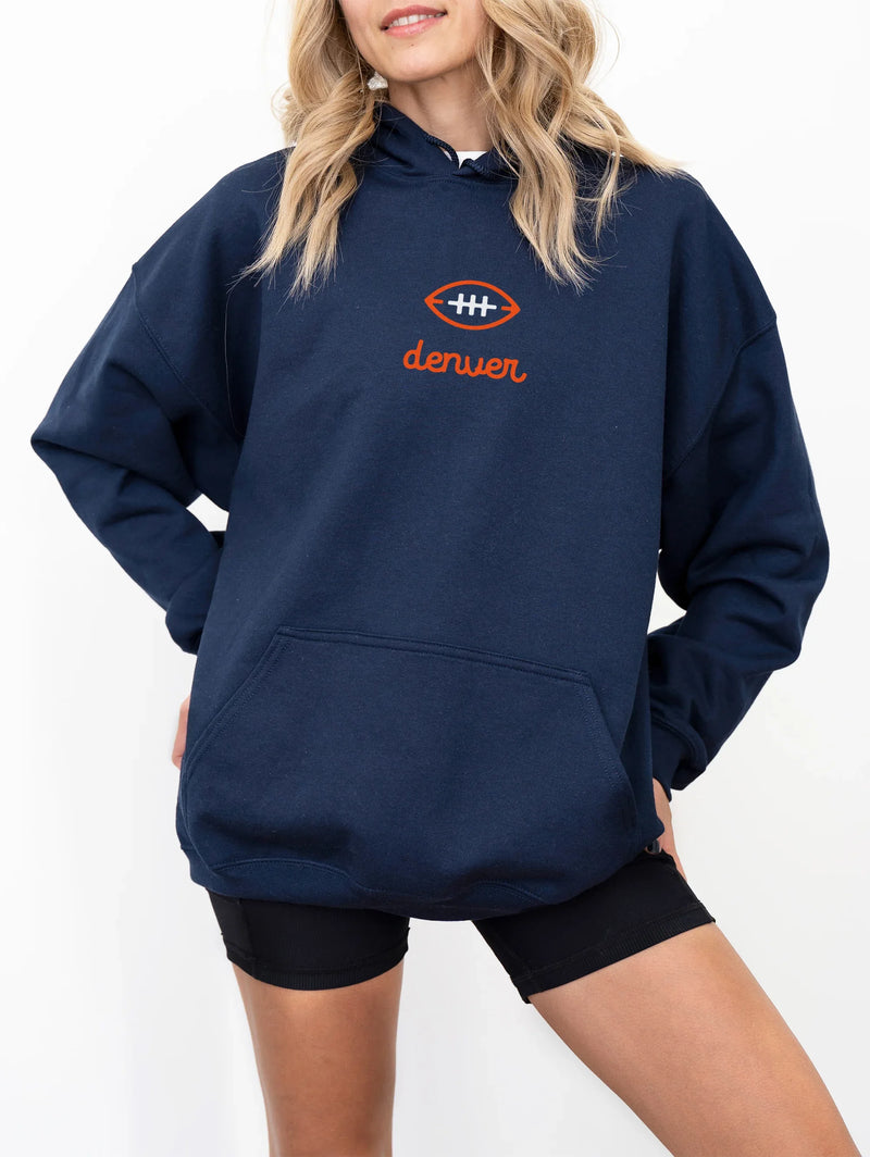 Cute navy Denver Broncos hoodie, vintage football streetwear sweatshirt for men and women for sale at Throwbacks