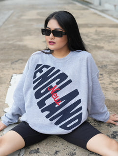 Retro NEw England patriots football sweatshirt in grey with large oversized red and navy graphic on a heavyweight crewneck for men and women