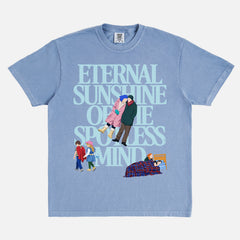 Cute Eternal Sunshine of the spotless mind movie t-shirt with large oversized front print illustrations of scenes from the movie on a vintage faded blue unisex graphic tee