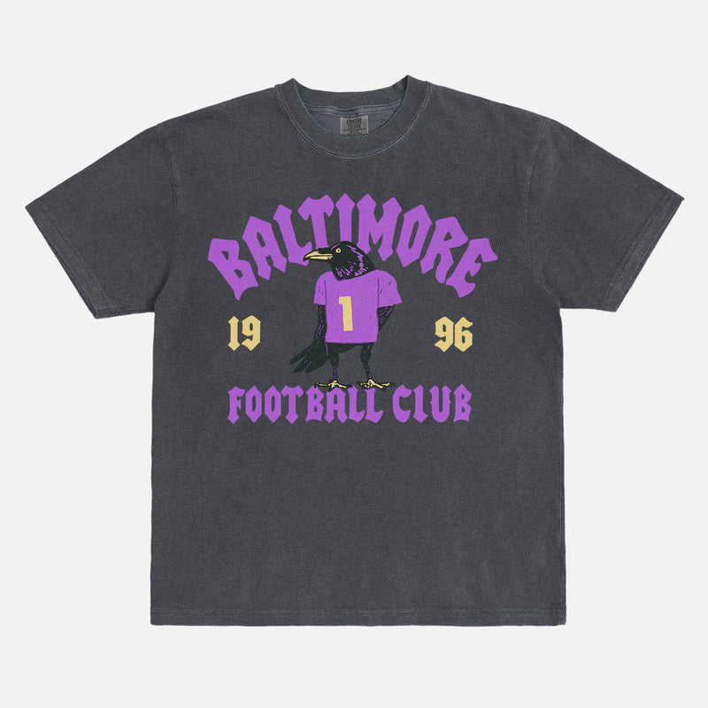 Retro black and purple Baltimore ravens nfl football fan graphic tee with streetwear text and raven mascot