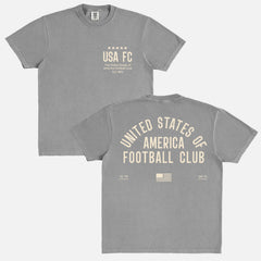 Cool Vintage United States USA FC World Cup team t-shirt with old school jersey lettering on a faded grey unisex comfort colors t-shirt