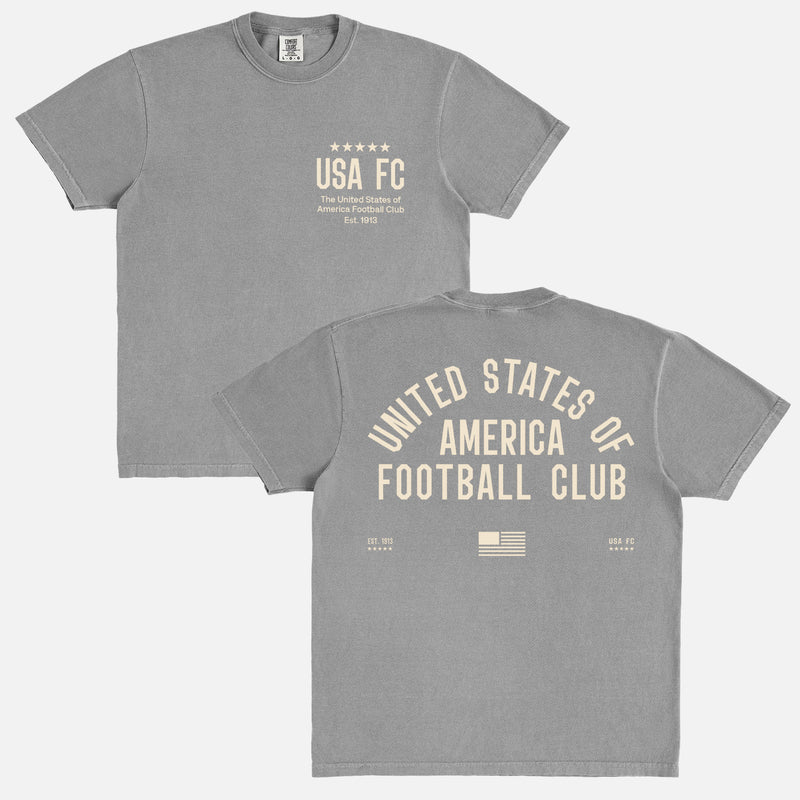 Cool Vintage United States USA FC World Cup team t-shirt with old school jersey lettering on a faded grey unisex comfort colors t-shirt