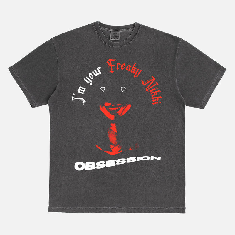 Grunge Obsession movie streetwear t-shirt with Nikki movie quote and poster text on a faded black comfort colors tee
