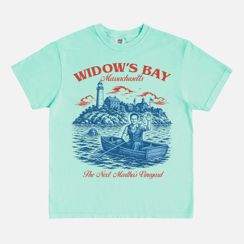 Funny Widow's Bay TV Show t-shirt with retro travel poster and sea hag on a green Comfort Colors graphic tee