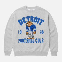 Vintage Detroit Lions football fan sweatshirt with old school mascot graphic and streetwear font on a unisex premium cotton crewneck