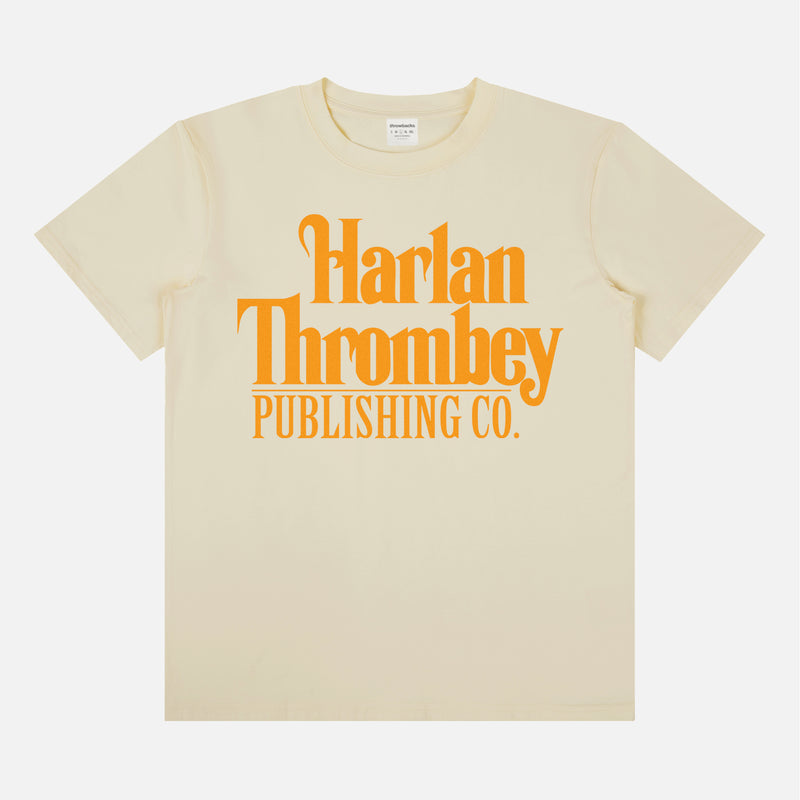 Knives out movie t-shirt, original Knives out movie graphic tee beige with large oversized yellow Harlan Thrombey Book Publishing Co logo on the front