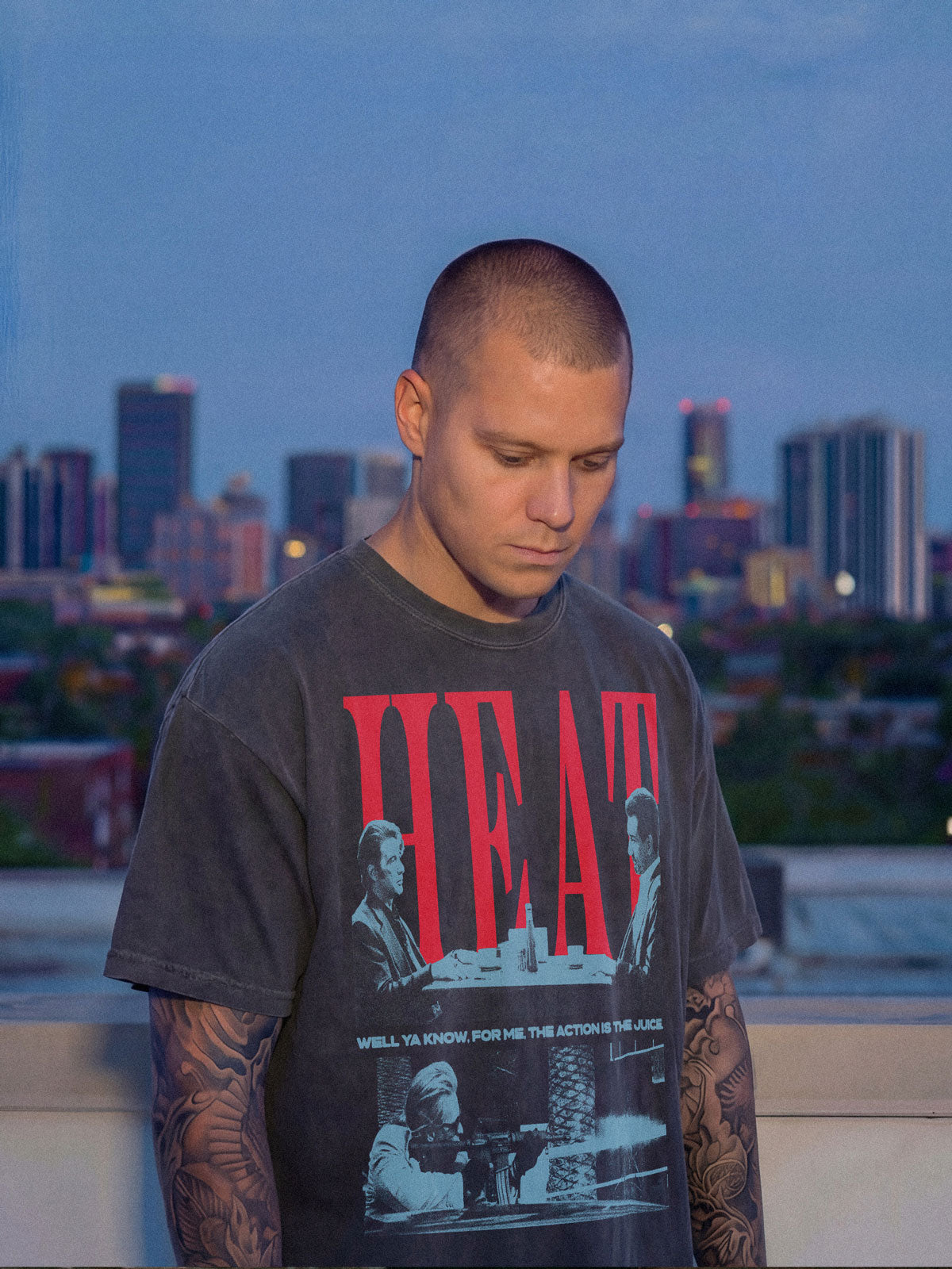 1995 Heat Movie Graphic t-shirt with grunge halftone illustration of the diner scene and Val Kilmer street shootout on a faded black streetwear tee