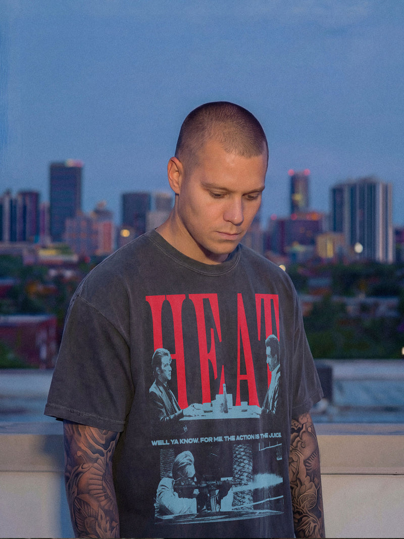 1995 Heat Movie Graphic t-shirt with grunge halftone illustration of the diner scene and Val Kilmer street shootout on a faded black streetwear tee