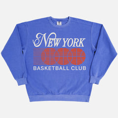 Premium heavyweight New York Knicks sweatshirt with 1990's NY bball logo graphic on a washed blue comfort colors crewneck
