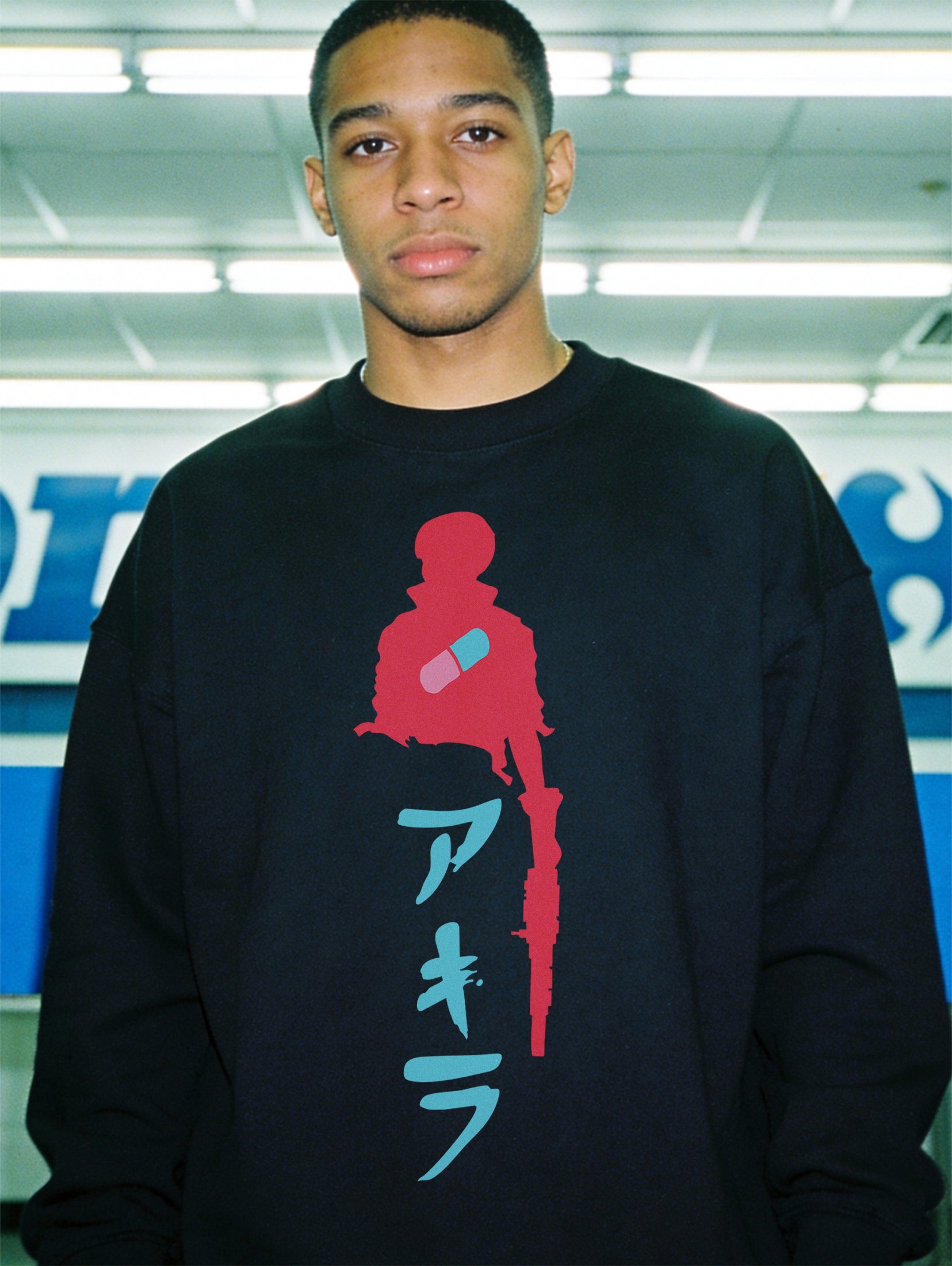 Oversized heavyweight akira anime crewneck sweatshirt in black with red and blue manga movie art