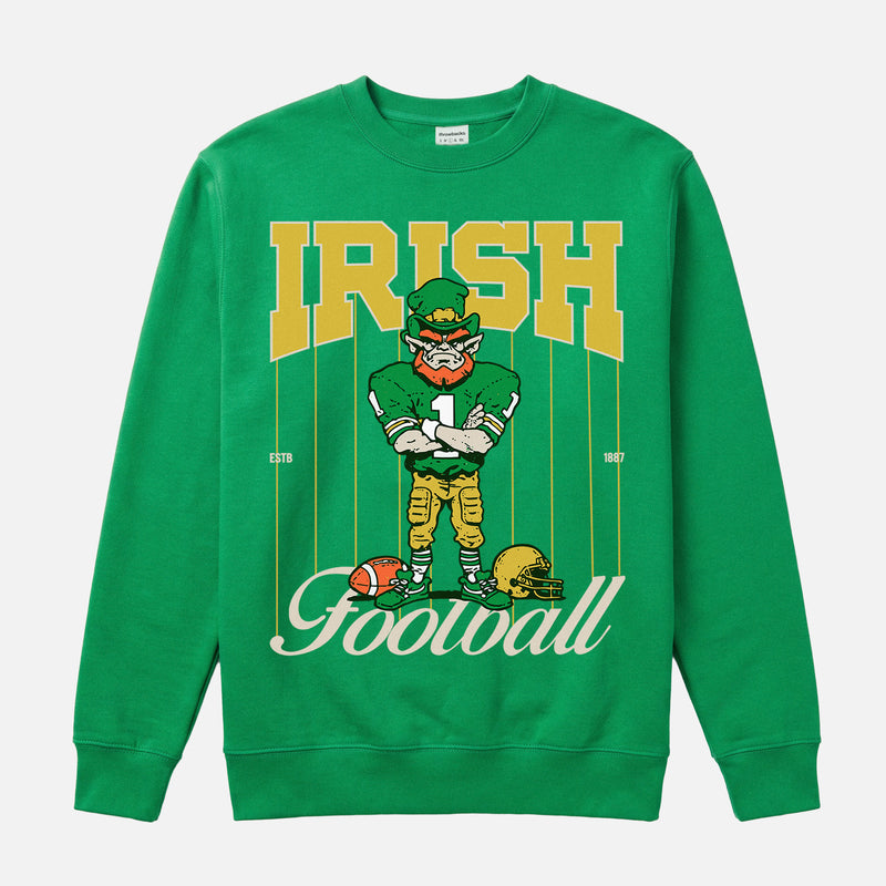 Vintage Notre Dame Fighting Irish crewneck with green and gold leprechaun mascot and retro pinstripes on a kelly irish green sweatshirt for men and women
