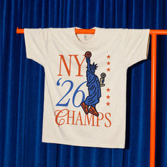 New York Knicks 2026 NBA Champs streetwear graphic tee with statue of liberty trophy on an off white comfort colors t-shirt