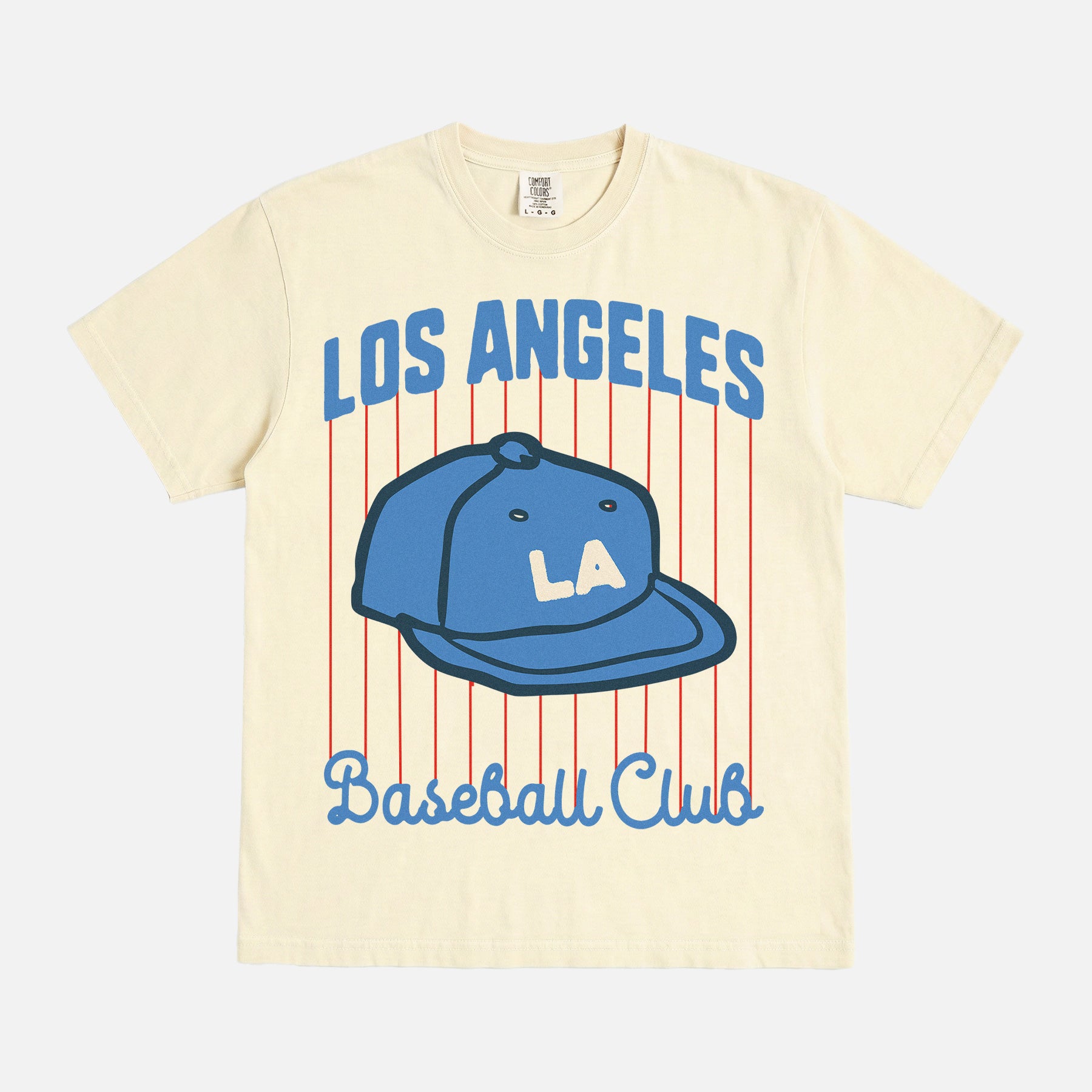 Retro Los Angeles Dodgers pinstripes t-shirt with LA baseball hat on a washed cream comfort colors graphic tee for men and women