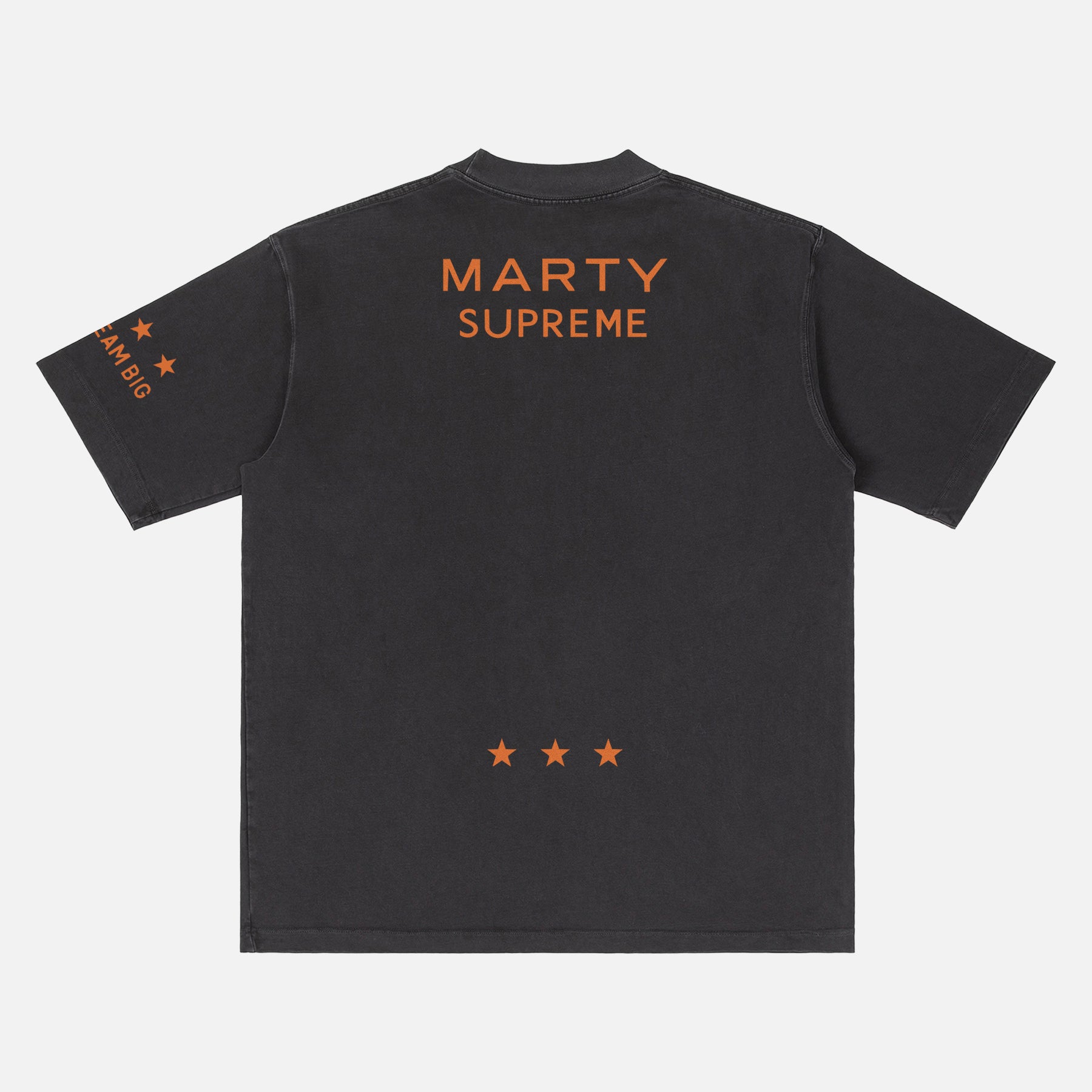 Retro Marty Supreme movie washed black graphic tee shirt with front back and sleeve print of orange movie poster logo, ping pong balls, and dream big 