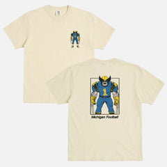 Michigan Wolverines college football t-shirt with Wolverine from X-Men as mascot football player on an off white comfort colors graphic tee