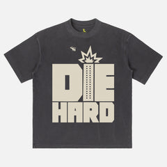 Faded black Die Hard movie shirt with retro movie poster text and nakatomi plaza