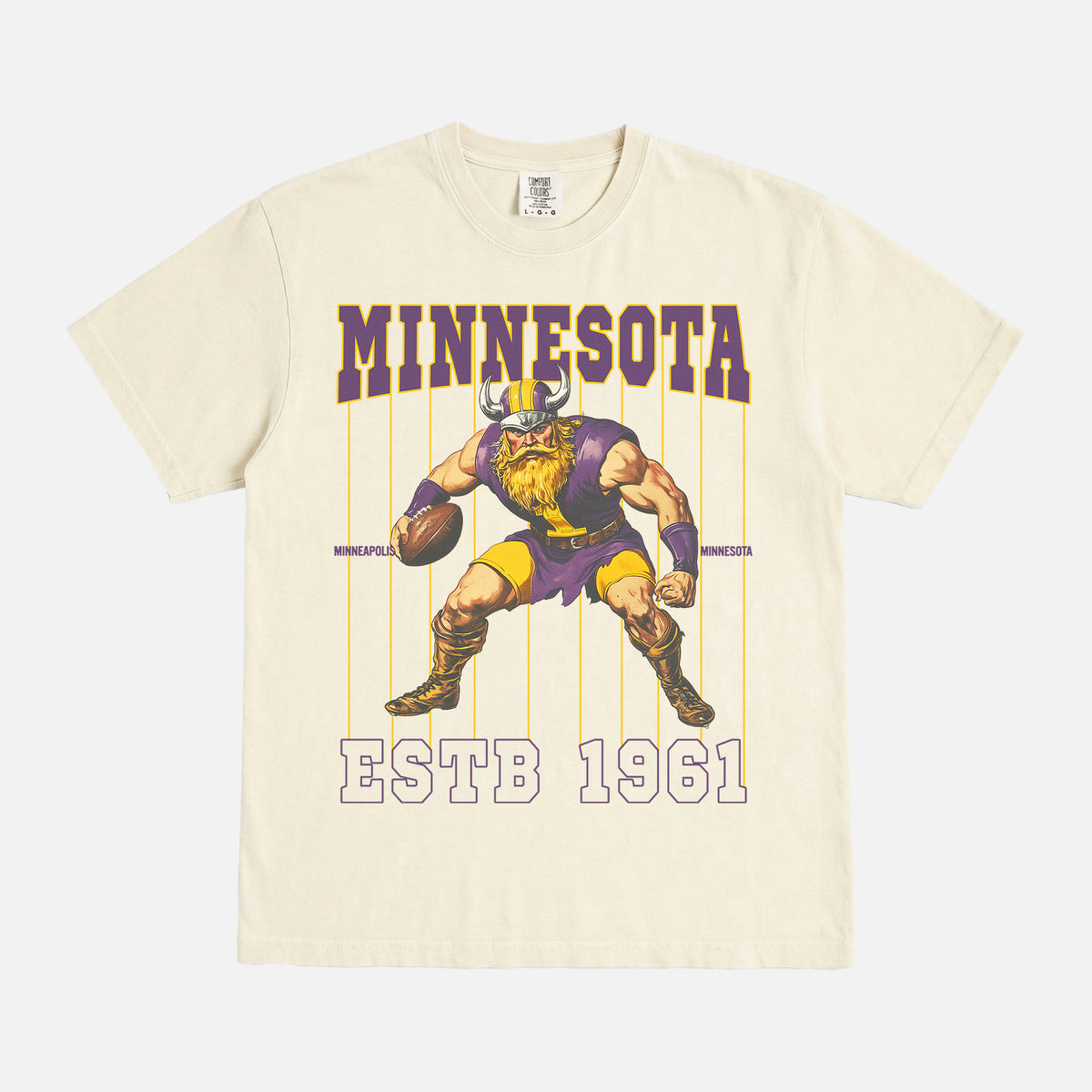 old school minnesota vikings graphic t-shirt with retro mascot pinstripes design on a washed cream comfort colors tee