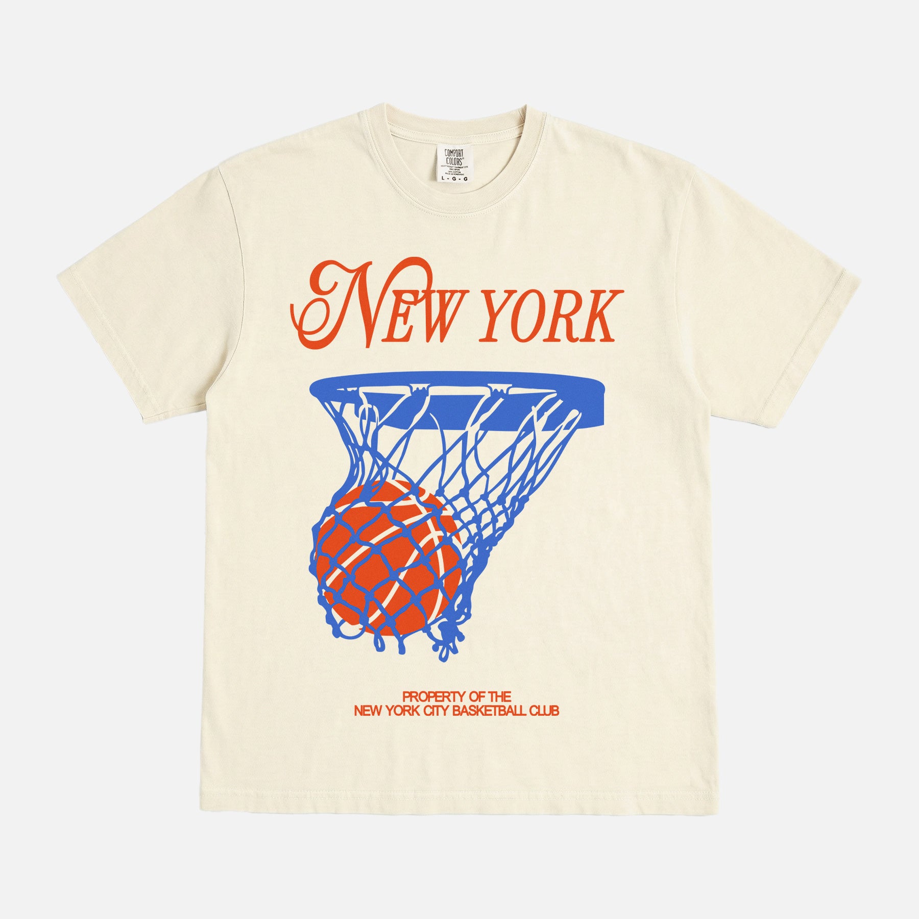 Off white New York Knicks t-shirt with retro orange and royal blue streetwear art and retro jersey lettering on a unisex comfort colors graphic tee