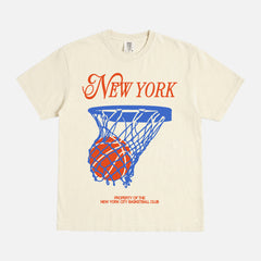 Off white New York Knicks t-shirt with retro orange and royal blue streetwear art and retro jersey lettering on a unisex comfort colors graphic tee