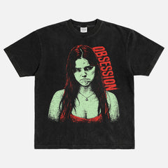 Distressed black Obsession 2026 movie bootleg graphic tee shirt with Nikki frowning
