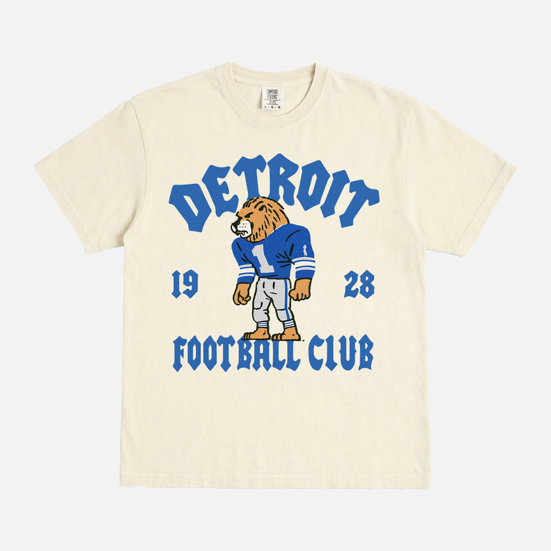 Detroit Lions nfl football t-shirt with throwback design and mascot art on an off white comfort colors graphic tee