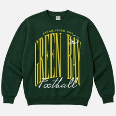 Vintage 1990's Green Bay Packers football sweatshirt with old school logo on a green crewneck for men and women for sale at Throwbacks