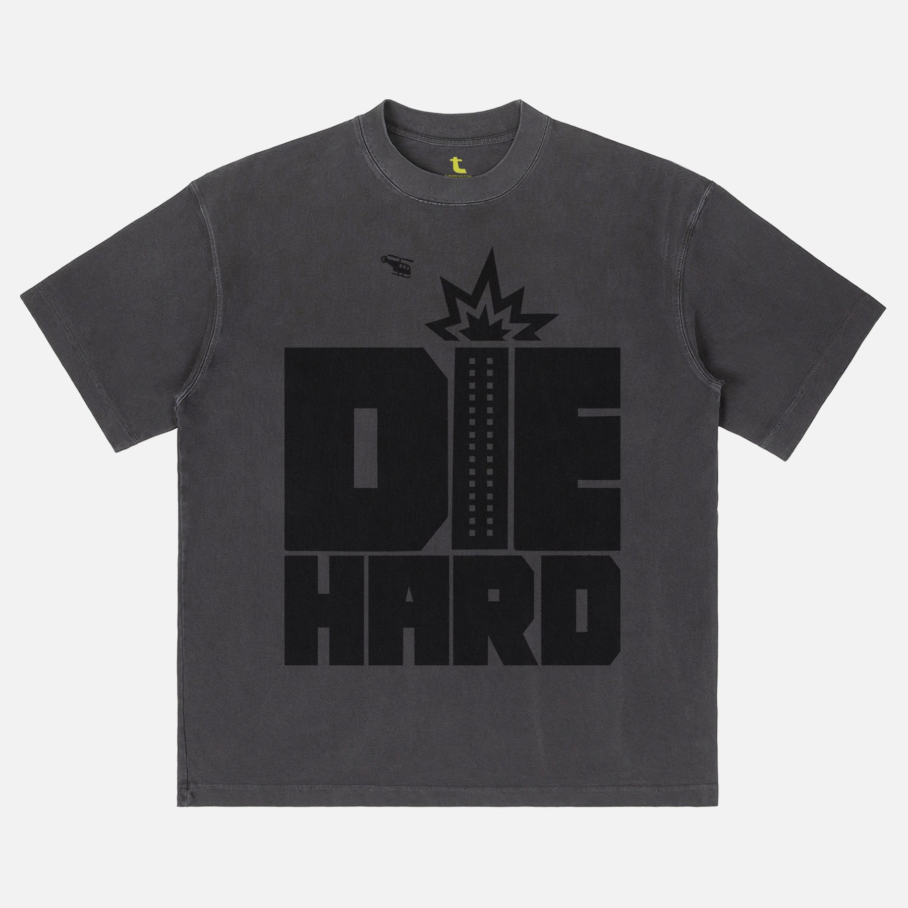 Faded black Die Hard movie shirt with retro movie poster text and nakatomi plaza