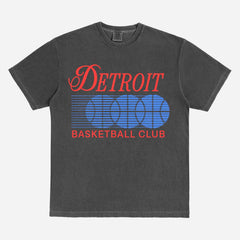 Vintage 1990s Detroit Pistons basketball graphic t-shirt with retro bball graphic on a washed black comfort colors tee