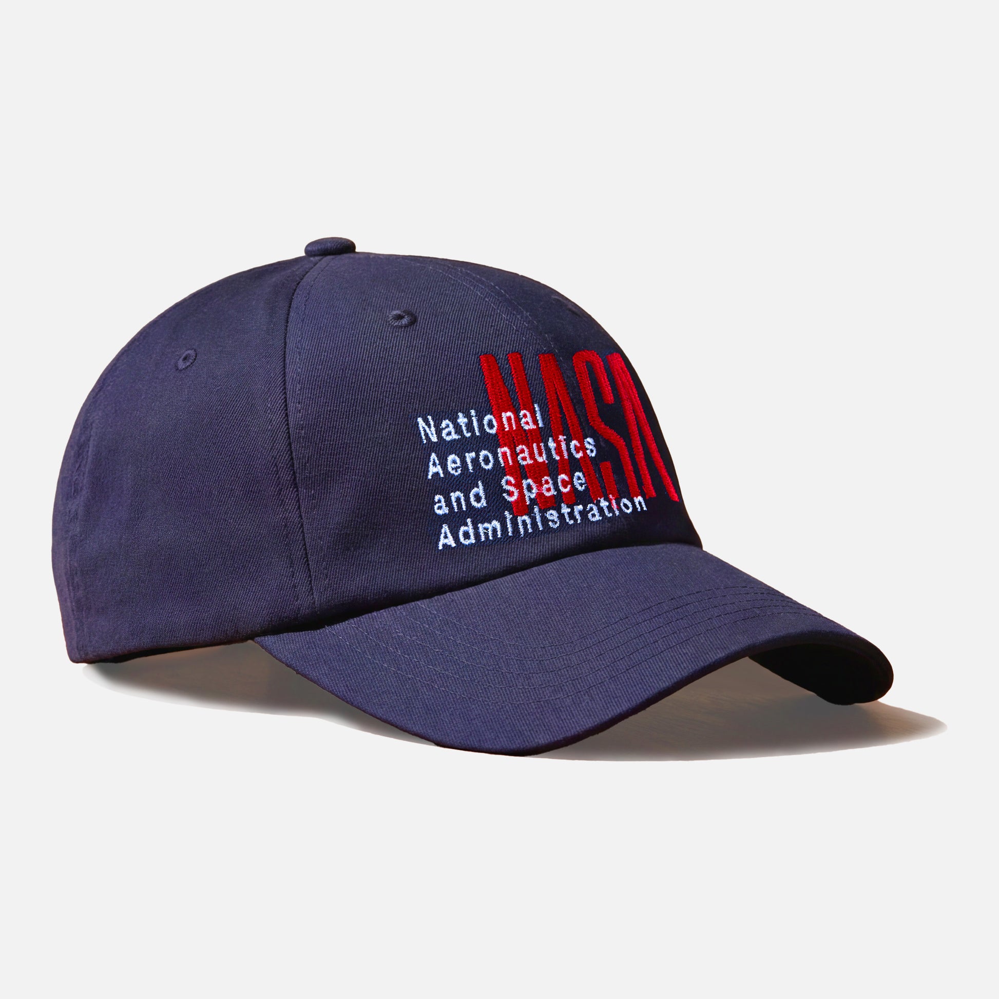 NASA worm logo with red and white embroidered on a navy dad hat