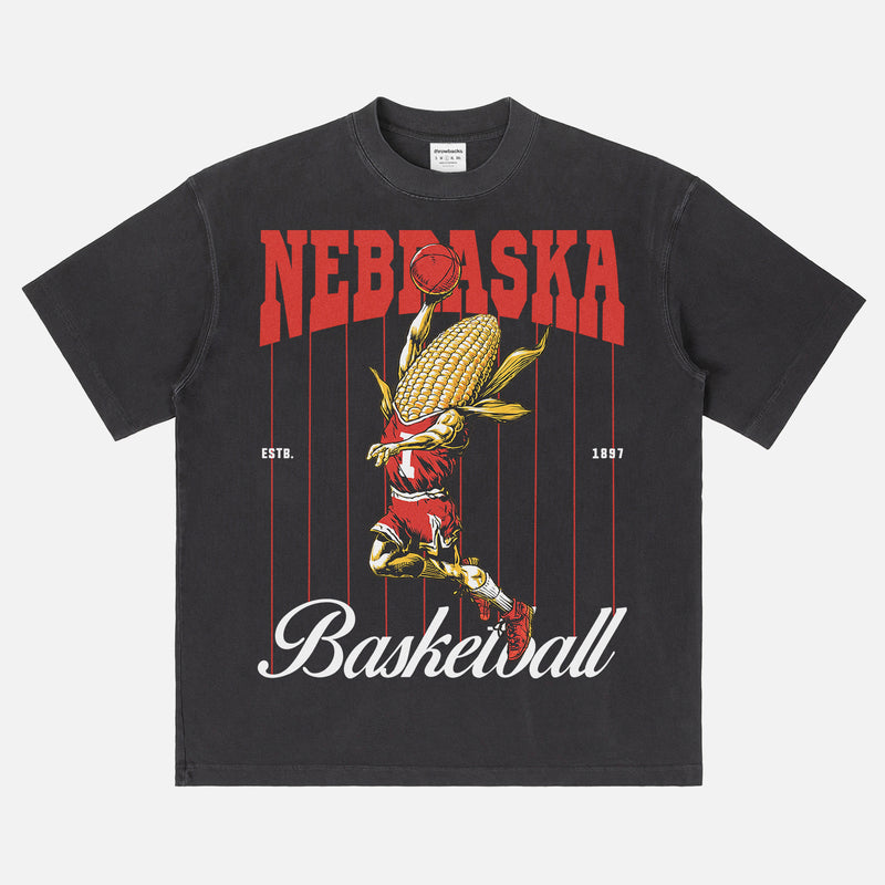 Vintage Nebraska Cornhuskers College Basketball Graphic T‑shirt with retro corn-on-the-cob mascot and pinstripes on an washed black and red bball tee for men and women