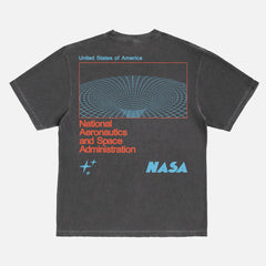 faded washed black NASA streetwear graphic t-shirt with custom Worm logo and wormhole graphic on a unisex comfort colors shirt