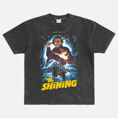 Stanley Kubrick's The Shining horror movie graphic t-shirt with custom movie poster art on a washed black heavyweight streetwear tee