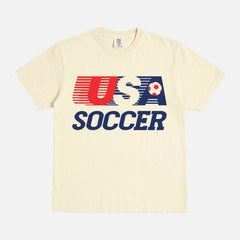 Retro USMNT USWNT United States Soccer logo t-shirt with striped USA soccer graphic on a washed cream unisex comfort colors tee