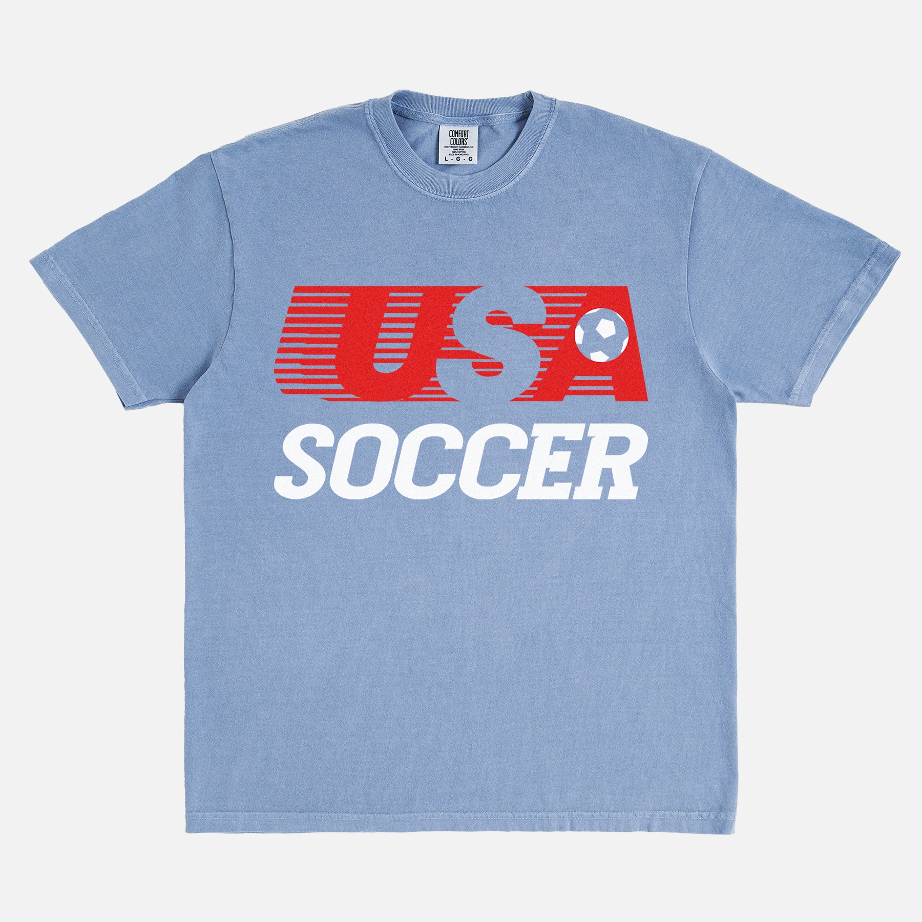 Retro USMNT USWNT United States Soccer logo t-shirt with striped USA soccer graphic on a washed blue unisex comfort colors tee