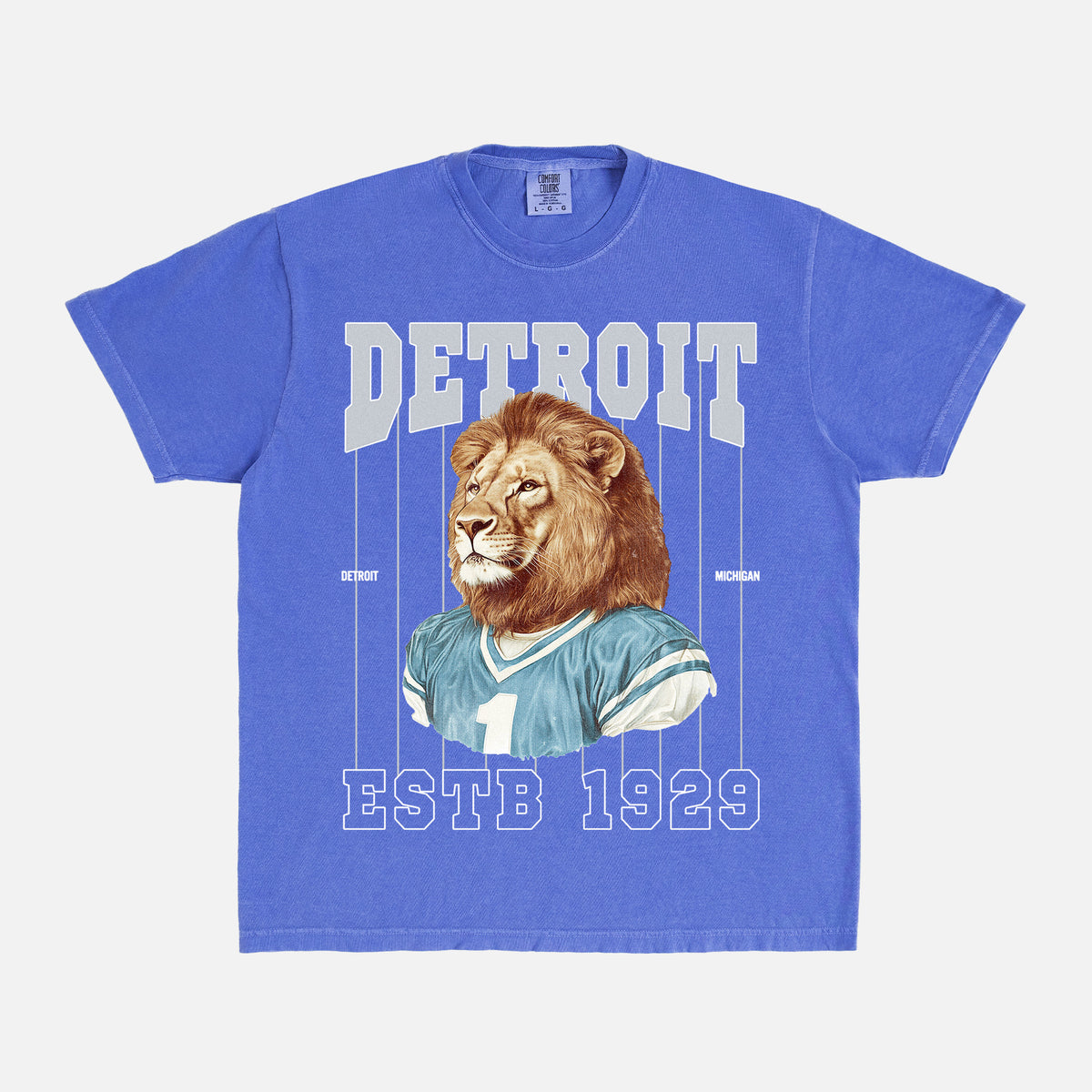 Retro Detroit Lions mascot pinstripes t-shirt with vintage 90s blue and silver graphic on a washed royal comfort colors graphic tee for sale at Throwbacks