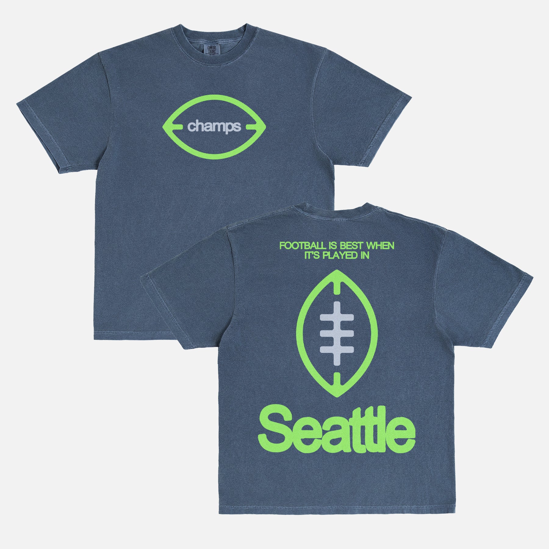Seattle Seahawks Super Bowl Champs T‑shirt on washed navy Comfort Colors with front Champs logo and “Football is Better in Seattle” back graphic. 