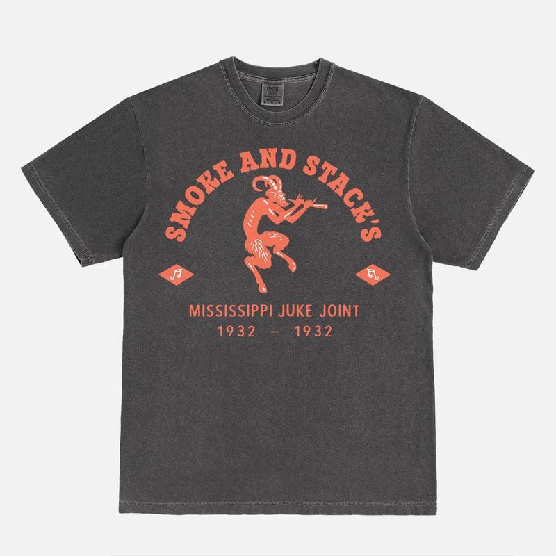 Ryan Coogler Sinners Movie t-shirt with orange Smoke and Stack's juke joint logo on a washed black unisex graphic tee