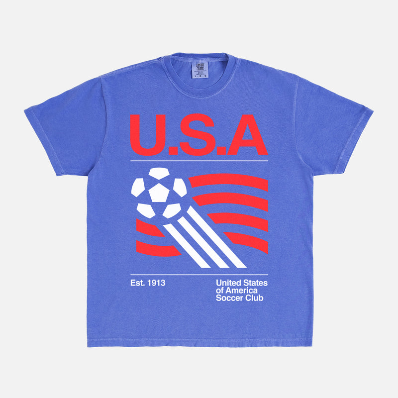 Vintage United States Soccer Team T-Shirt with 1990's World Cup graphic on a washed royal blue graphic tee for men and women for sale at Throwbacks